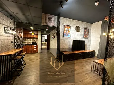 Two-bedroom apartment with a living room, smart finishing, 2 bathrooms, balcony, and parking. The apartment is fully furnished and offers a large spac