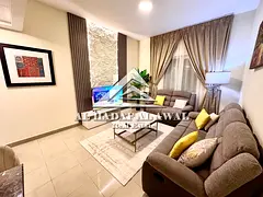 One-bedroom apartment with a living room and distinctive furnishings for monthly rent in Almajaz3- 5