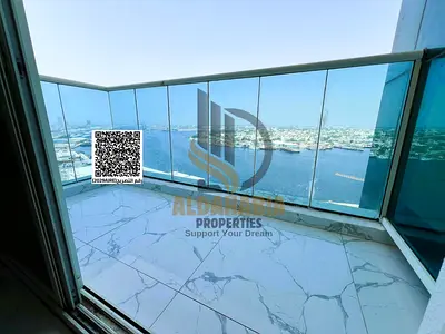 شقة غرفتين وصالة بإطلالة مفتوحة على خور عجمان في برج الواحة تاور 2 بسعر مميز