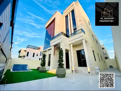 Luxury modern villa with swimming pool for sale. Two floors and a rooftop terrace. Located in Al Alia, one of Ajman's most prestigious areas. High-end