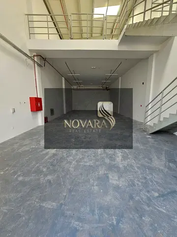 A prime warehouse on the main street in Al Jurf Industrial Area 3, 3000 feet with a mezzanine, 12m height, 32 kW electricity, prime location, 150,000.