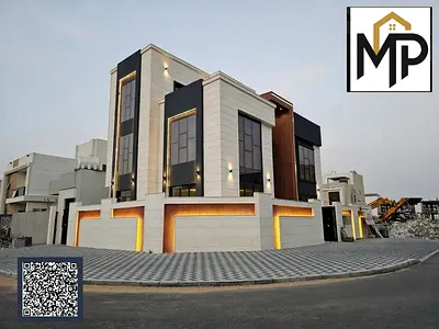 Luxury corner villa in Al Bahia – Ajman | Two floors + roof | 7 master bedrooms | Majlis and 2 living rooms | Modern kitchen | All-inclusive price