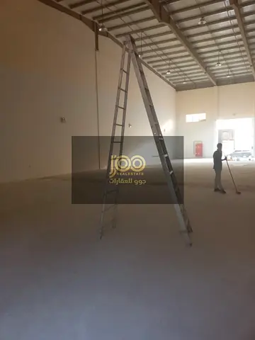 Warehouse for rent in Umm Al Quwain, Umm Al Thu'ub area. It features a prime location suitable for storage or commercial activity.