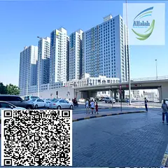 2bed rooms and a hall big size for sale in city towers ajman with two bathrooms and a big kitchen an