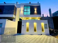Townhouse for sale in Al Helio 2 Ajman 5 master bedrooms stone facade large built up area rooftop se
