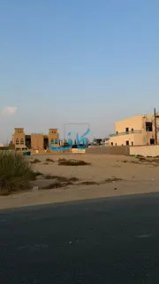 Residential land for sale in Al-Hawshi, a very distinguished location