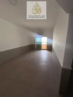 🏡 For Rent in Ajman – Al Rawda 2 A spacious two-bedroom apartment with a living room, in a prim