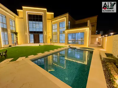 A luxurious villa with exceptional spaces and a sophisticated modern design, a symbol of luxury and elegance in the Al Yasmin area of ​​Ajman.