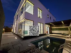 Two villas for sale, each with panoramic views, featuring a swimming pool inside the villa. The vill