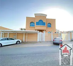 Two-storey villa for rent in Ajman, Msheirif area  7 master bedrooms, a council and a hall  And a ki