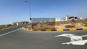 For sale residential land corner in Sharjah / Tilal City . a garden view, and close to  masar  proje