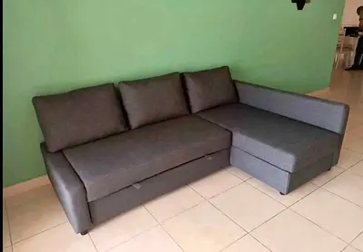 Ikea L Shape Sofa cum bed with big storage in L