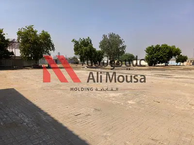 Spacious Open Yard for Rent – Ali Mousa Compound, Sajaa