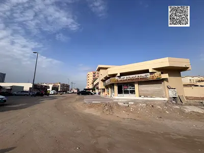قطعه ارض للبيع بعجمان.الروضه1. مساحه 10 الاف قدم.سكني تجاري.عليها جزىء مبني محلات تجاريه علي شارع مكه مباشره عدد6 محلات بدخل قديم :72.000 قابل للزياده