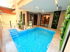 A luxury villa in Al Amerah - Ajman, ready for immediate occupancy with high-end finishes and spacio