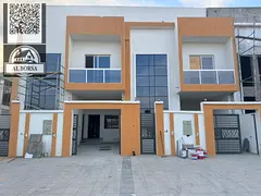 For sale in Al-Haliyo 2, a townhouse with 4 master bedrooms, a living room, a majlis, a kitchen, and