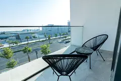 Modern 3BR Oasis with Balcony in Azizi Riviera | Free full cleaning service