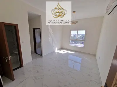 Two bedrooms and a living room with two bathrooms, first occupancy, spacious areas, excellent finishing, and at the lowest prices in Ajman.