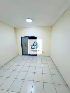 Spacious 1bhk With Balcony close Hall Al Nahda Sharjah Call Adnan