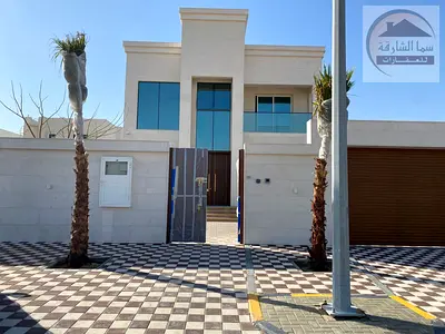 A 6500 sq ft villa with a courtyard and swimming pool, located in a prime location opposite palaces and on a 24-meter wide street, featuring custom fi