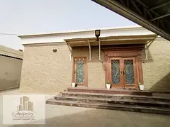 Two adjacent villas for sale in the Emirate of Sharjah, specifically in the Al Ghafiya area