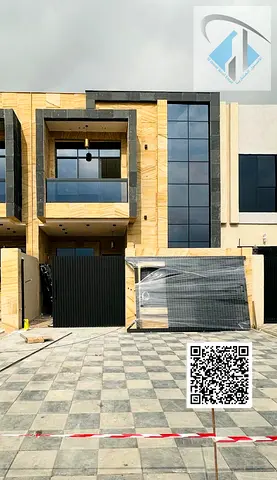 Villa for sale in Ajman, Al Helio 2 area. The villa consists of 5 master bedrooms, a majlis (formal sitting room), a living room, and a maid's room. F