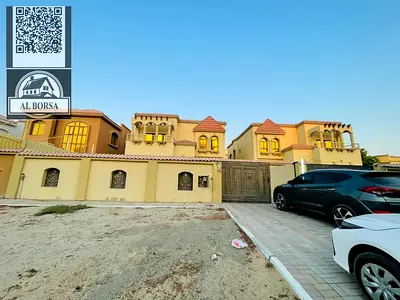 Villa for rent in Ajman Al Muwaihat 2 on the corner of two streets, beautiful location, payment facilities