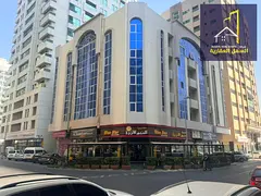 For sale, a building in Al Qasimia area, on the corner of two streets, in an excellent location, and