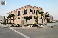 For sale: Brand new two-story villa on a corner lot in Al Yasmin, in a strategic location, overlooki