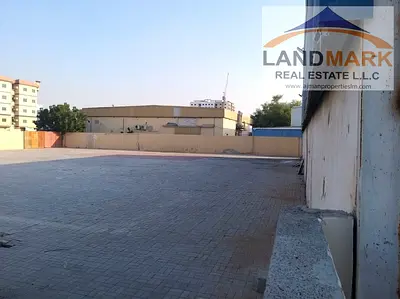 أرض مفتوحة للإيجار مع سور و انتر لوك في الجرف 2 عجمان