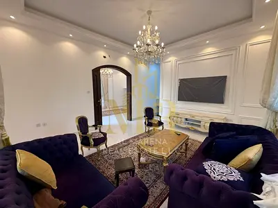 Corner villa in Al Yasmin, price includes electricity, water, air conditioning, and furnishings.