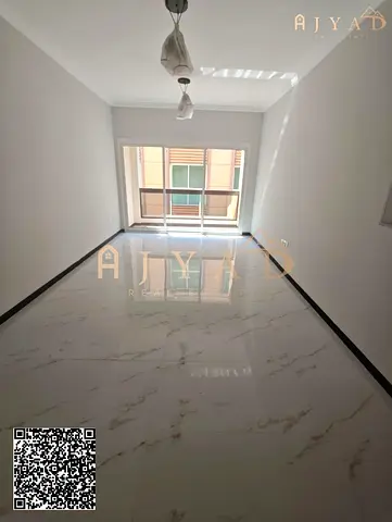 For rent: 2 bedrooms hall in Al Mowaihat 3 Ajman, brand new building, 3 bathrooms, 1400 sq ft, prime location, one month free