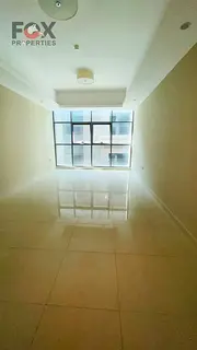 **Apartment with pool &amp; gym, master bedroom, prime location in one of Ajman’s top towers, balc