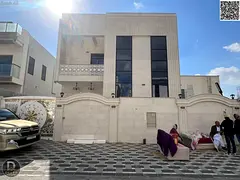 For sale: A luxurious villa with a modern design and contemporary exterior finishes in the Al Yasmin
