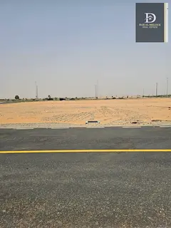 For Sale in Sharjah Al Dabdaba North Commercial Land Prime Location On Main Street Opposite Al Yasme
