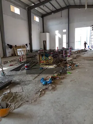 Warehouse for rent in Umm Al Quwain, Umm Al Thu'ub area. It features a prime location suitable for storage or commercial activity.