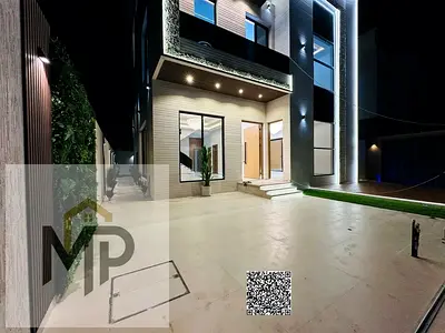 Turnkey villa, all registration fees included, on the main street, ready to move in, in one of Ajman's most prestigious areas. Freehold ownership for