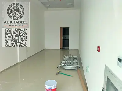 "Prime shopfront for annual rent on Al Zahya Main Street Ajman 400 sq ft fully equipped with internal bathroom preparatory kitchen and central AC read