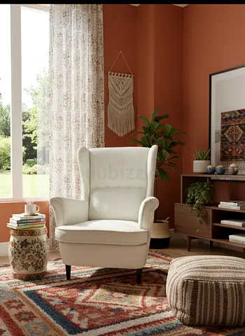 Classic Wingback Accent Chair Elegant wingback design with soft cream upholstery. High backrest and