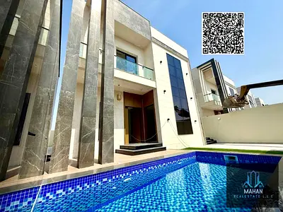 فيلا راقية بتصميم هندسي فاخر في منطقة الحليو 2 بعجمان، وهي واحدة من أكثر المناطق السكنية تميزًا لما توفره من هدوء وجودة بناء وموقع استراتيجي قريب من الخدمات