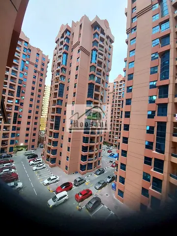 SPACIOUS 1 BHK WITH BALCONY APARTMENT IN AL NAUMIYA TOWERS AJMAN GOOD FOR INVESTMENT in AED 330,000/=