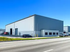 Strategic Main Road Warehouse in Al Sajaa | Ideal for Logistics &amp; Industry
