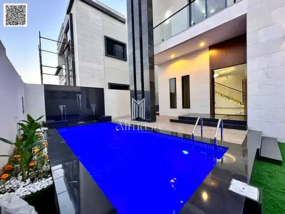 Rare and unique investment opportunity in Ajman a modern villa with a yard swimming pool and luxurious finishing