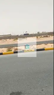 Industrial Land in Al Saja'a Industrial Area - On a main 36-meter wide road Freehold for Arabs 99-ye