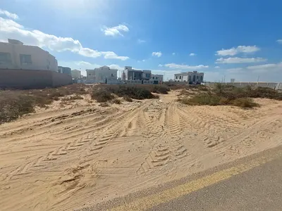 For sale, a plot of land in the Emirate of Sharjah - Al Hoshi area - Al Badia suburb
