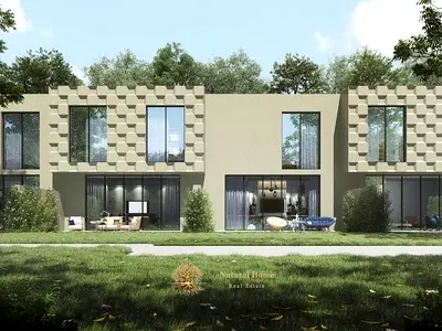 High ROI Potential: Freehold 2BR Townhouse in Prime Hayyan Location