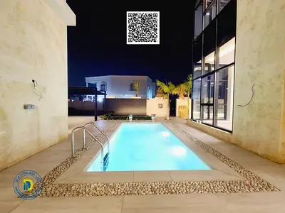 Prime location in Al Yasmin, luxury villa with 6 bedrooms, roof terrace, and swimming pool, including electricity, water, and air conditioning.