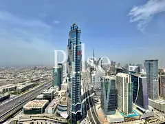 Corner 3BR + Maid | Canal, Sea, Burj Khalifa Views