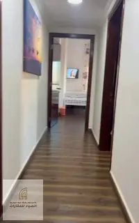 Two-bedroom apartment with living room for sale in Al Qasba – ready to move in with a parking spac