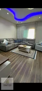 Two-bedroom apartment with living room for sale in Al Qasba – ready to move in with a parking spac
